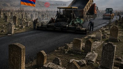12 qəbiristanlığımızın üzərindən asfalt yol çəkilib