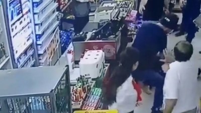Marketdə arvadını döyən kişi həbs olundu