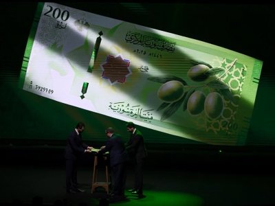 Bəşər Əsədin fotosu silindi