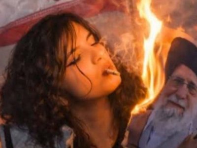 Xameneinin fotosuna od vurub siqaret yandırdılar - GÖRÜNTÜ