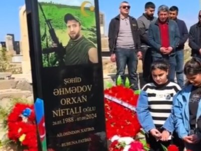 Məzar daşındakı "şəhid" yazısı mübahisə yaratdı: Din və qanun nə deyir?
