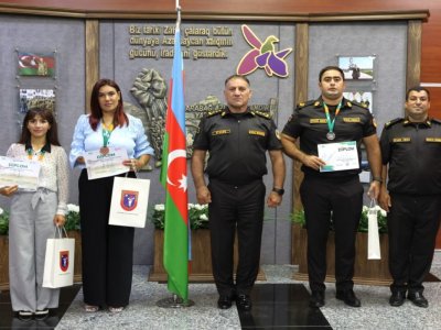 FHN-in əməkdaşları qol güləşi və atıcılıq yarışlarında uğur qazandılar - FOTOLAR