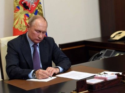 Putin miqrasiya nəzarətini sərtləşdirən qanunları imzaladı