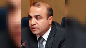Azay Quliyev QHT xəbərçilərini təbrik edib