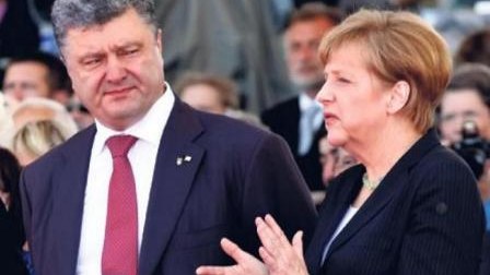 Poroşenko Merkeli Ukraynaya dəvət etdi 