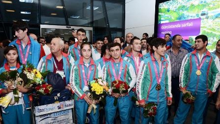 Olimpiya çempionalarımız  vətənə qayıdıb