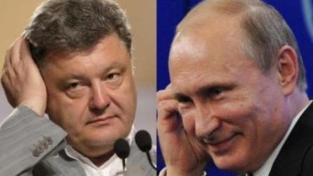 Poroşenkodan  atəşkəsə görə Putinə JEST 