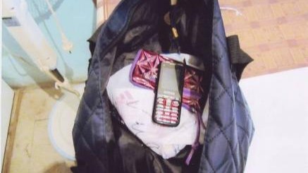 Məhbus oğluna telefon aparan ana tutuldu