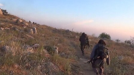 Uyğur türkləri Bəşər Əsədə qarşı döyüşür