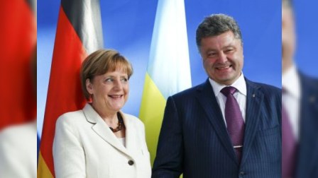 Merkel Poroşenko ilə Berlində görüşəcək