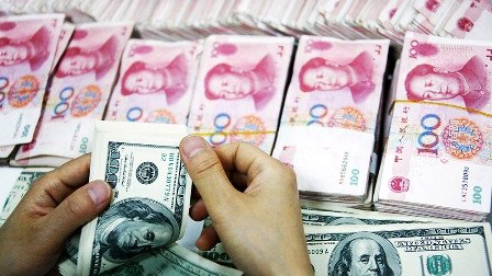 Böhran dalğası Çini də vurdu – ölkə valyutası ucuzlaşdı