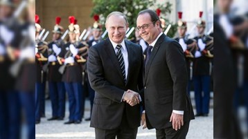 Olland Putini Parisə dəvət edib