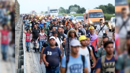 Norveçi tərk edən miqrantlara 9 min dollar ödənəcək
