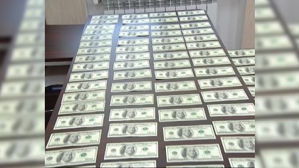 Bakıda külli miqdarda saxta dollar satanlar yaxalandı