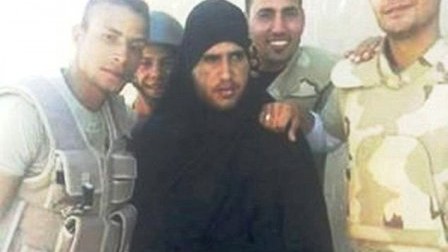İŞİD döyüşçüsü qadın libasında ifşa edildi – FOTO