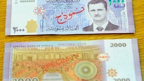 Suriyada &uuml;zərində Bəşər Əsədin şəkli olan pul buraxıldı