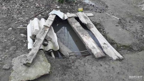 Azərbaycanda dəhşət: Ananın meyiti su quyusunda, körpəninki evdə tapıldı - FOTO