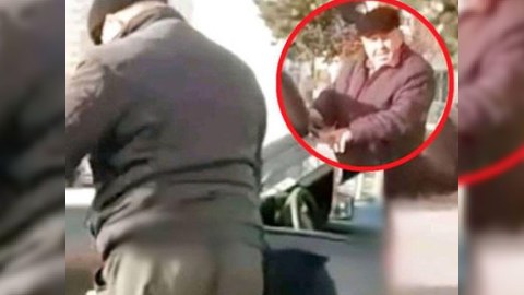 Maşınını bayraqla silən sürücü üzr istədi - VİDEO