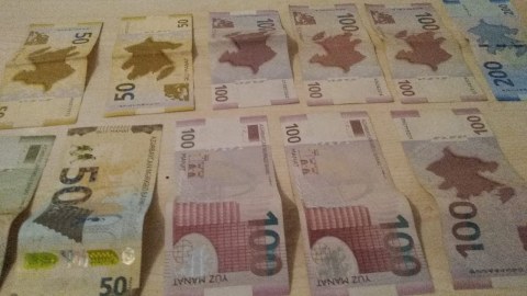 Evdən 21 min manat oğurladı - FOTO