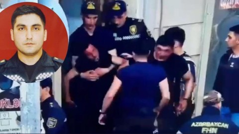 Polis gənc oğlanı xilas etmək üçün özünü təhlükəyə atdı - VİDEO