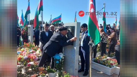 Xalq şəhidlərimizi anır - FOTOREPORTAJ