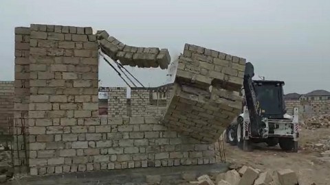 Buzovnada sənədsiz evlər söküldü - VİDEO