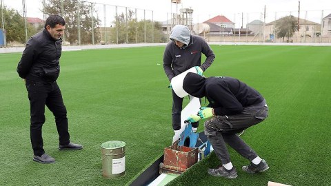 Binədə stadionun süni ot örtüyü dəyişdirildi - FOTO