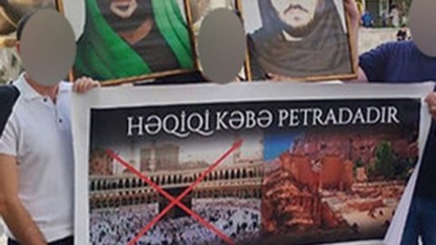 “28 Mall”un qarşısında plakat açan təriqət üzvləri həbs edildi