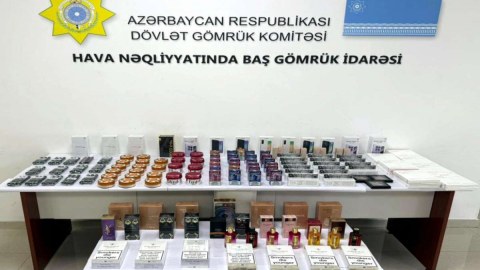Mallarını gömrükdən keçirmək məqsədilə sərnişinlərə payladı - YAXALANDI