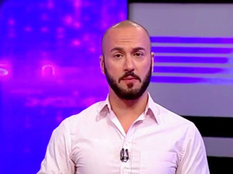 Efirdə Putinin anasını söyən jurnalist işdən qovuldu