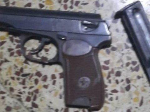 Məhkumun həyətində tapança və narkotik aşkarlandı