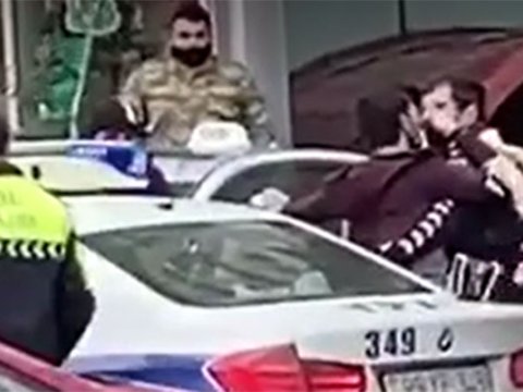DİN-dən polislə mübahisə edən sürücü ilə bağlı açıqlama