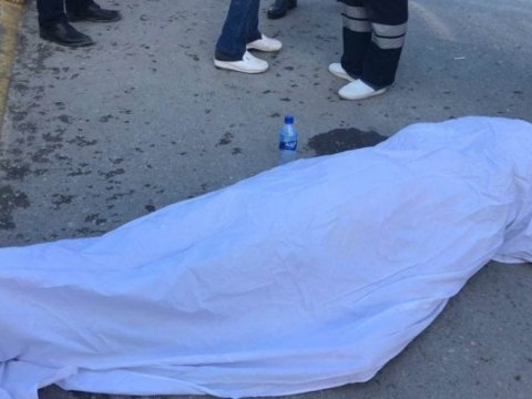 Binanın damında kişi meyiti aşkarlandı