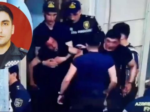 Polis gənc oğlanı xilas etmək üçün özünü təhlükəyə atdı - VİDEO