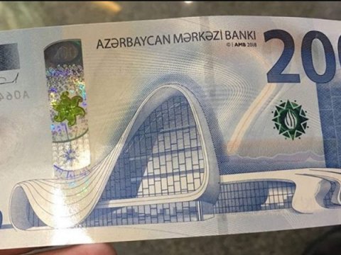 Mağazaya saxta pul verdi - TUTULDU