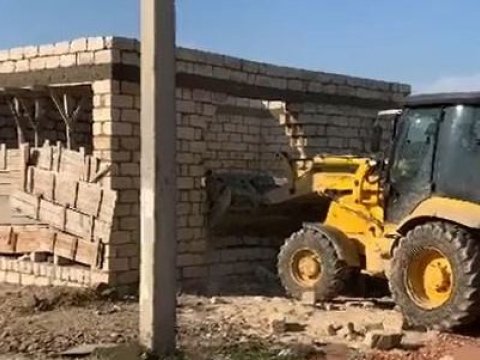 FHN qanunsuz tikilini sökdü - VİDEO
