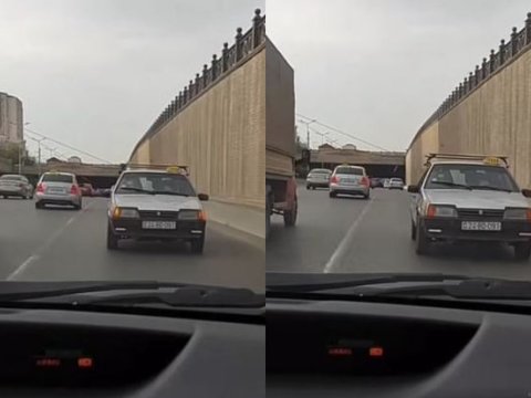 Daha bir sürücü maşını geriyə sürdü - VİDEO