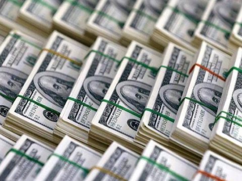 Banka saxta dollar verən şəxs tutuldu