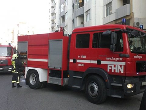 Çoxmərtəbəli yaşayış binasında YANĞIN