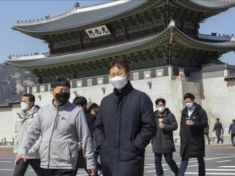 Daha bir ölkə koronavirus qadağalarını ləğv etdi 