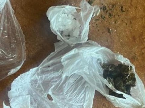 Həbsdə olan ərinə narkotik keçirmək istəyən qadın saxlanıldı