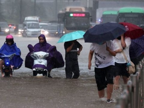 Çində güclü yağışlar: 20 mindən çox insan təxliyə edildi