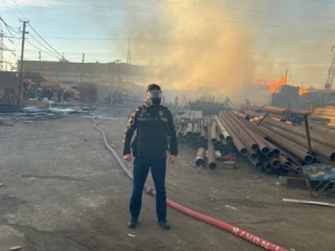 Polis yanğın baş verən ərazini mühafizəyə götürdü