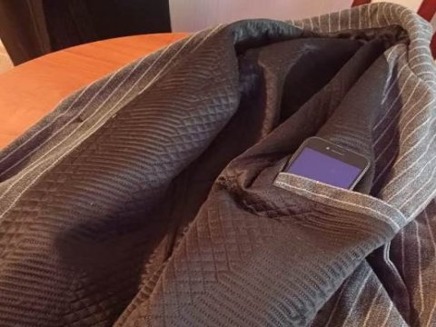 Ana həbsdə olan oğluna telefon ötürmək istədi yaxalandı