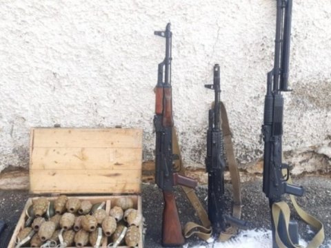 Xankəndidə avtomat, pulemyot və qumbaralar tapıldı