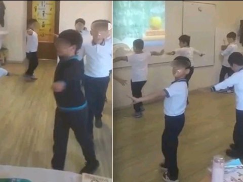 Şagirdlərin ağzını “skoç”layan müəllimə xəbərdarlıq edildi