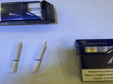 Həbsdəki həyat yoldaşına narkotik keçirmək istədi