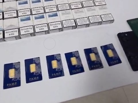 Telefonda gizlədilmiş qızıl külçələr aşkarlanıb