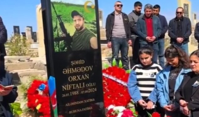 Məzar daşındakı "şəhid" yazısı mübahisə yaratdı: Din və qanun nə deyir?