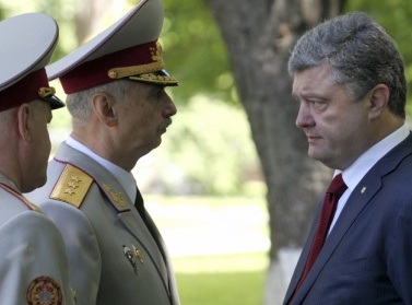 Poroşenkodan Putini sevindirəcək QƏRAR: Kiyev hərbi əməliyyatları dayandırır 